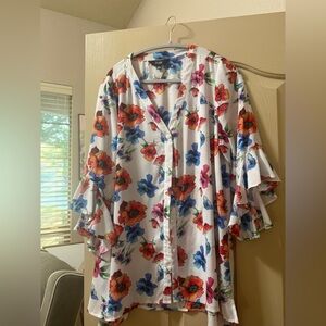 Loose floral top slim factor by investments, gently used.